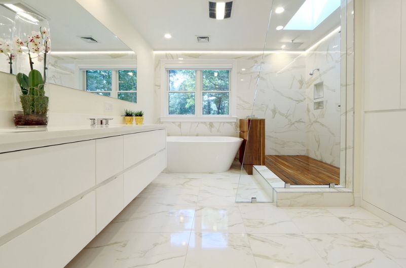 Beautiful-white-bathroom-with-marble-and-wood-deck-for-shower.jpg